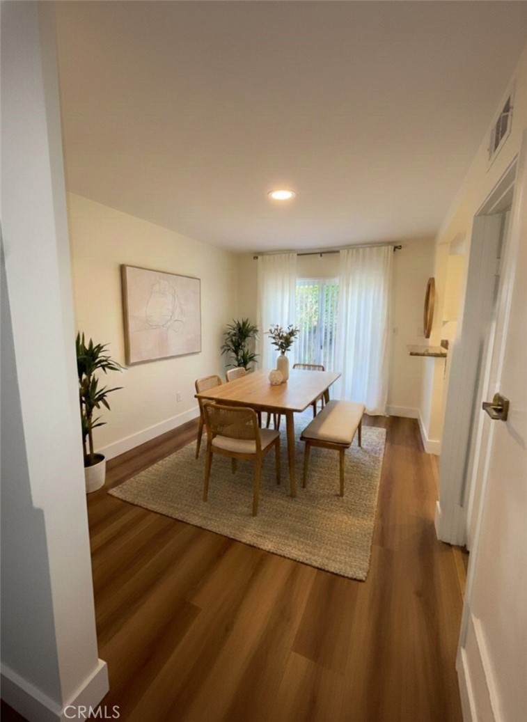 2255 Cahuilla Street, Unit 35 Colton, CA 92324 - Photo 2 of 24 a living room with furniture and a table