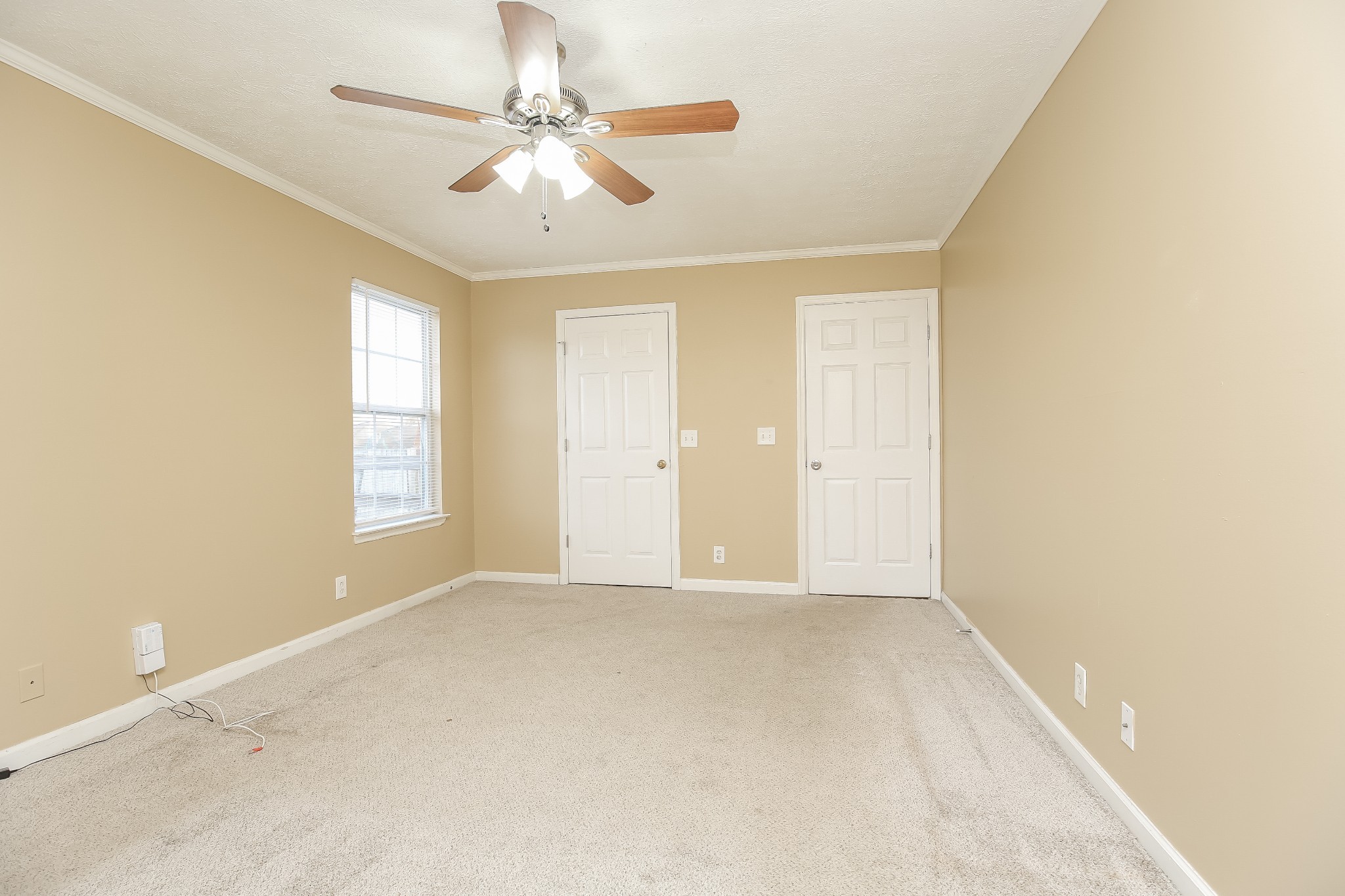 664 Crescent Road Murfreesboro, TN 37128 - Photo 8 of 16 an empty room with windows and ceiling fan