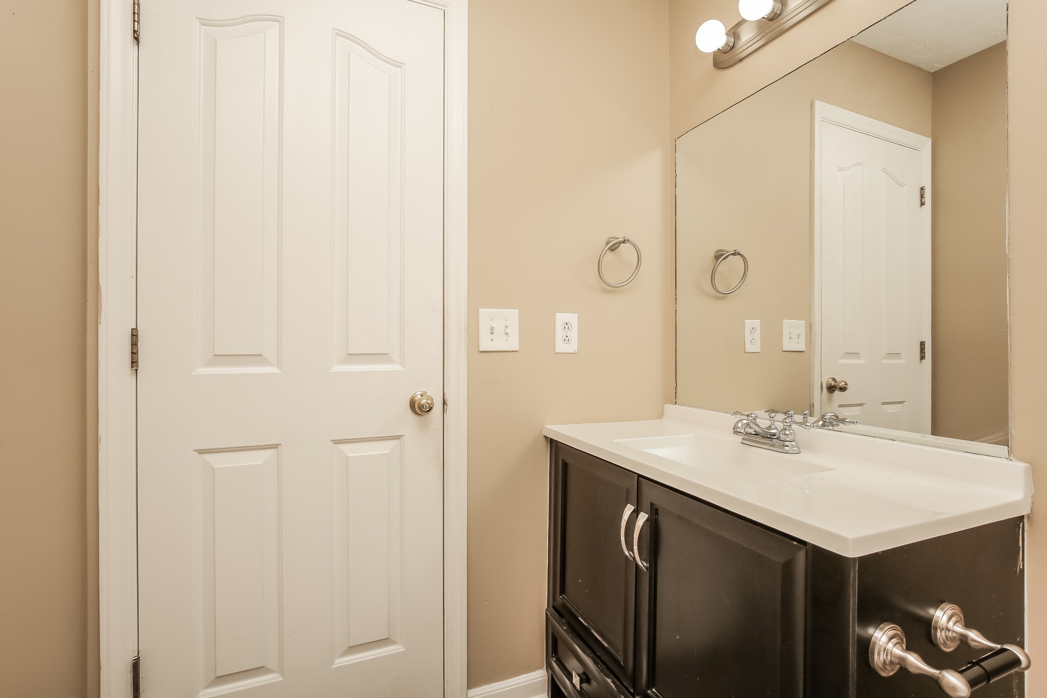 664 Crescent Road Murfreesboro, TN 37128 - Photo 10 of 16 a bathroom with a sink vanity and a mirror