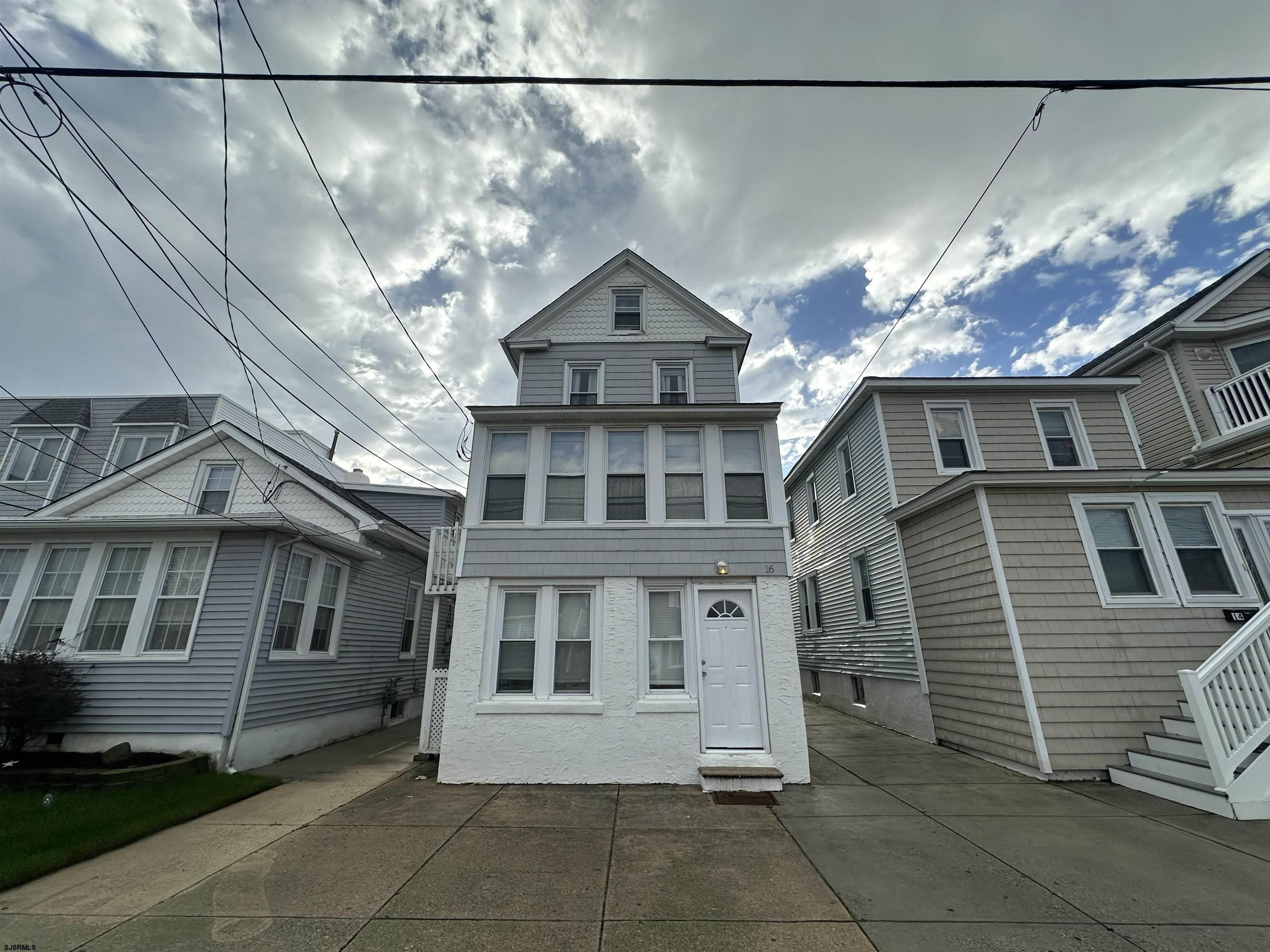 16 South Washington Avenue Margate City, NJ 08402 - Photo 1 of 14 a view of a house with a sink and a window