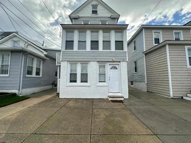 a view of a house with a garage