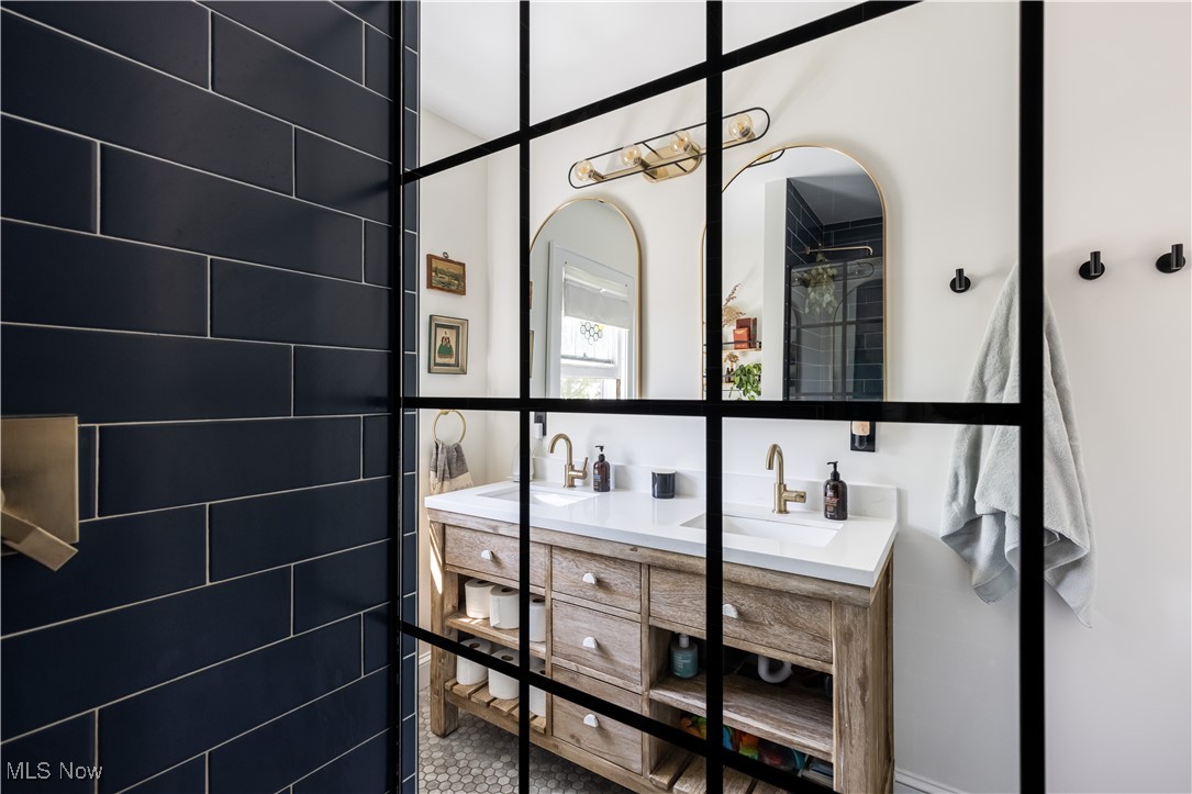 2671 Haddam Road Cleveland, OH 44120 - Photo 28 of 34 Bathroom featuring double vanity and tile patterned floors