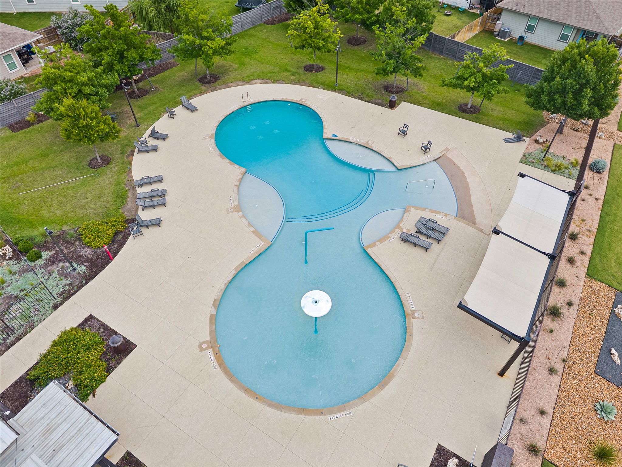 249 Century Plant Road Leander, TX 78641 - Photo 19 of 22 an aerial view of a swimming pool with outdoor space and seating