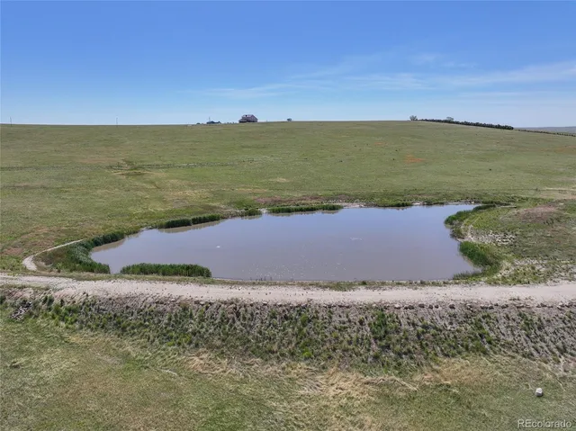 a view of an ocean beach and a mountain