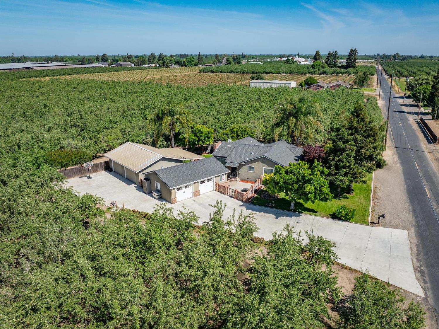 1431 Clark Road Modesto, CA 95358 - Photo 1 of 1 an aerial view of a house with a yard and lake view