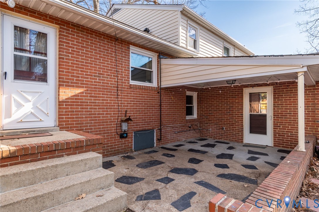 9303 Lawndell Road Henrico, VA 23229 - Photo 24 of 33 a view of a entryway door front of a house