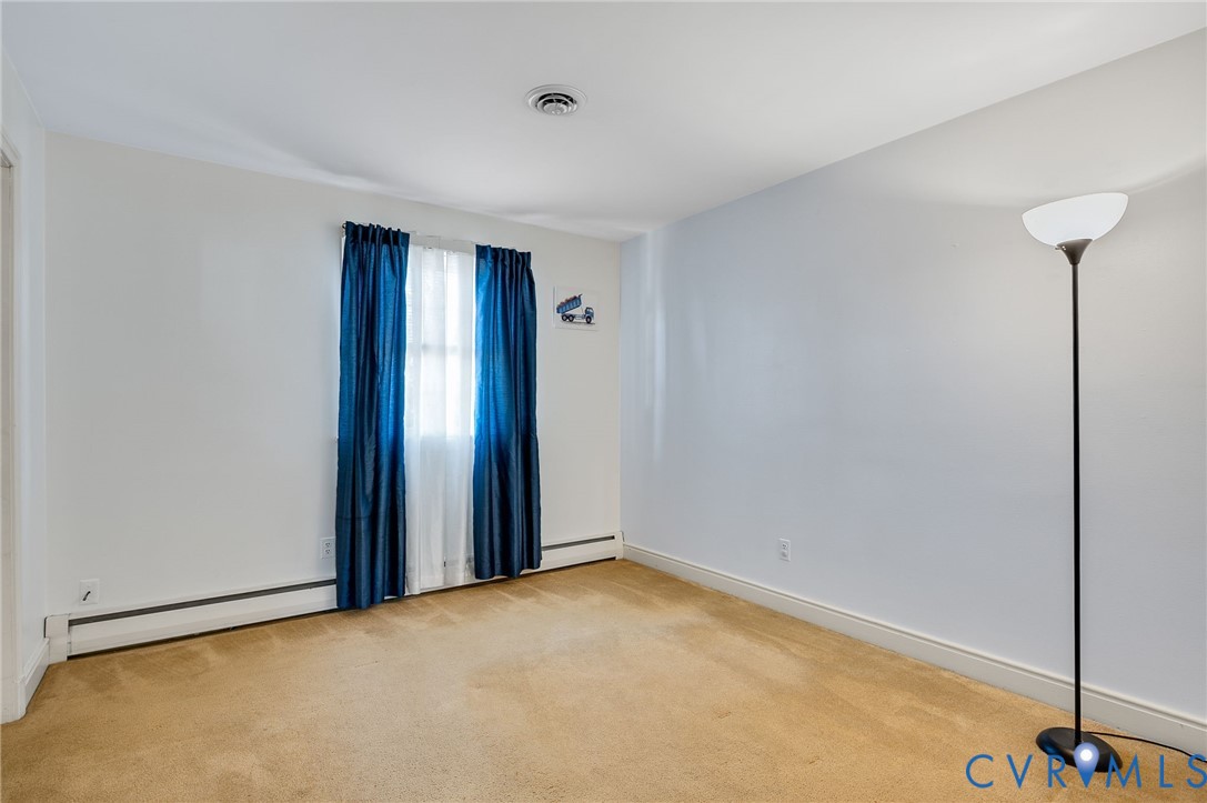 9303 Lawndell Road Henrico, VA 23229 - Photo 26 of 33 a view of an empty room with a window