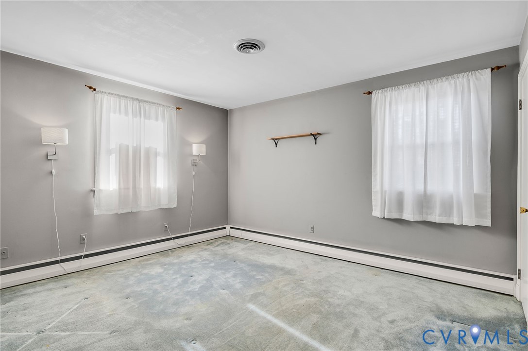 9303 Lawndell Road Henrico, VA 23229 - Photo 31 of 33 a view of an empty room with a window