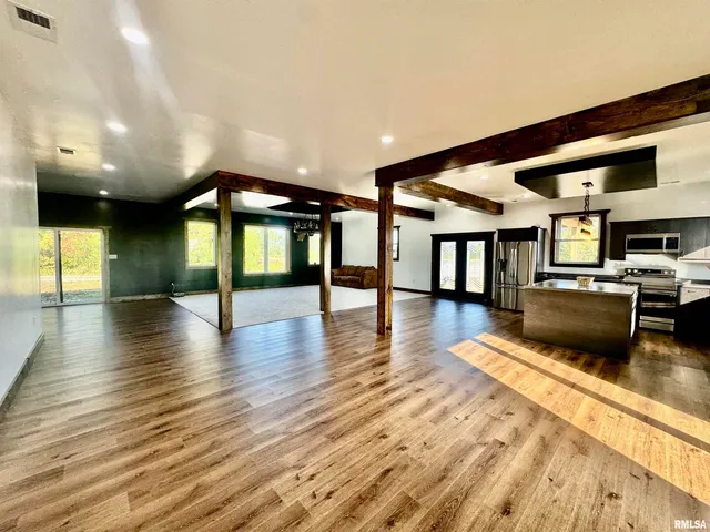a view of a lobby with black carpet