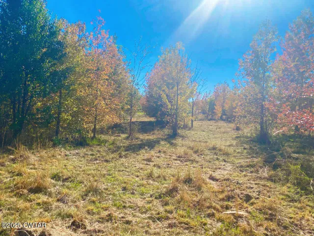 a view of lake with sunset