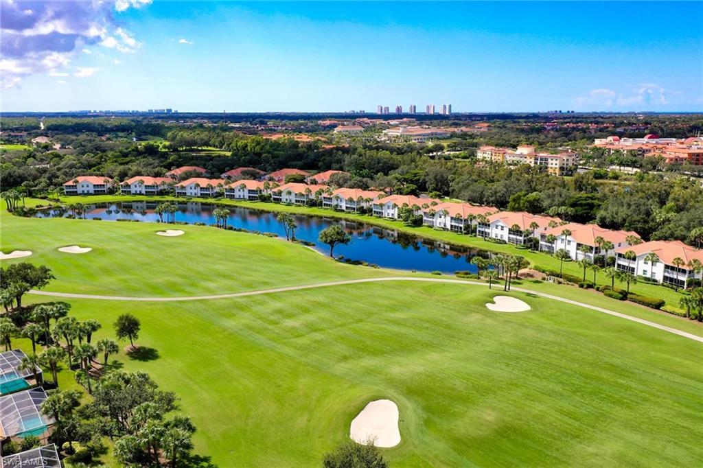 23101 Rosedale Drive, Unit 202 Estero, FL 34135 - Photo 42 of 49 a view of a basket ball ground and a fountain