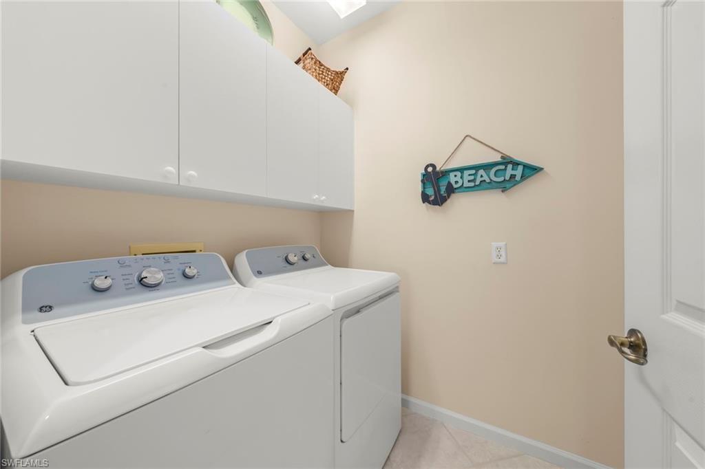 23101 Rosedale Drive, Unit 202 Estero, FL 34135 - Photo 49 of 49 a utility room with dryer and washer