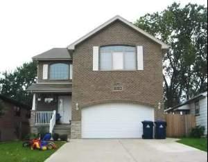 11004 Major Avenue Chicago Ridge, IL 60415 - Photo 1 of 1 a front view of a house with garden