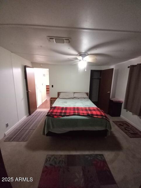 2100 North Trekell Road Casa Grande, AZ 85122 - Photo 13 of 21 a bedroom with a bed and a mirror