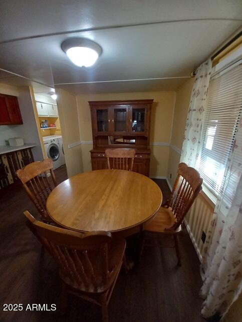 2100 North Trekell Road Casa Grande, AZ 85122 - Photo 7 of 21 a living room with furniture a flat screen tv and kitchen view