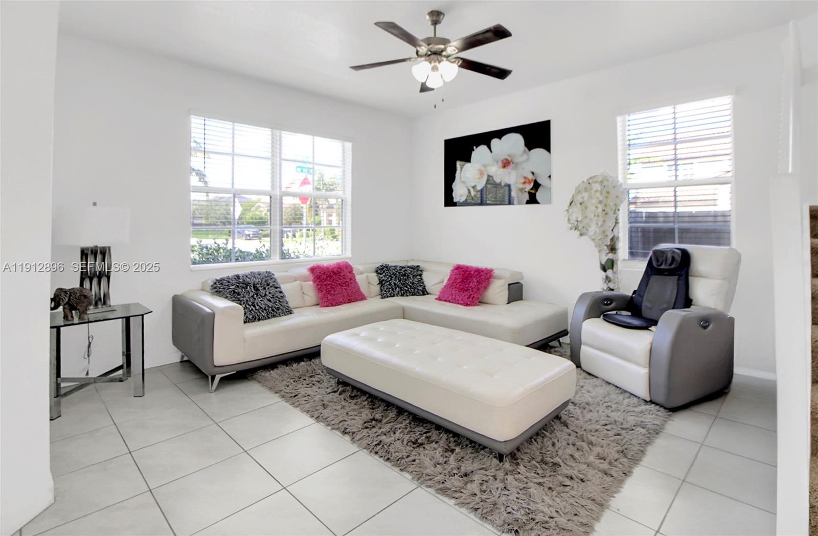 24301 Southwest 117 Path Homestead, FL 33032 - Photo 15 of 50 a living room with furniture and a window