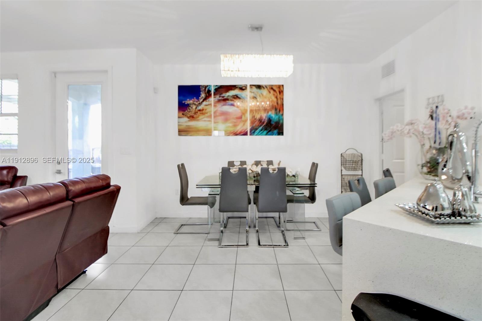 24301 Southwest 117 Path Homestead, FL 33032 - Photo 20 of 50 a living room with furniture and a mirror