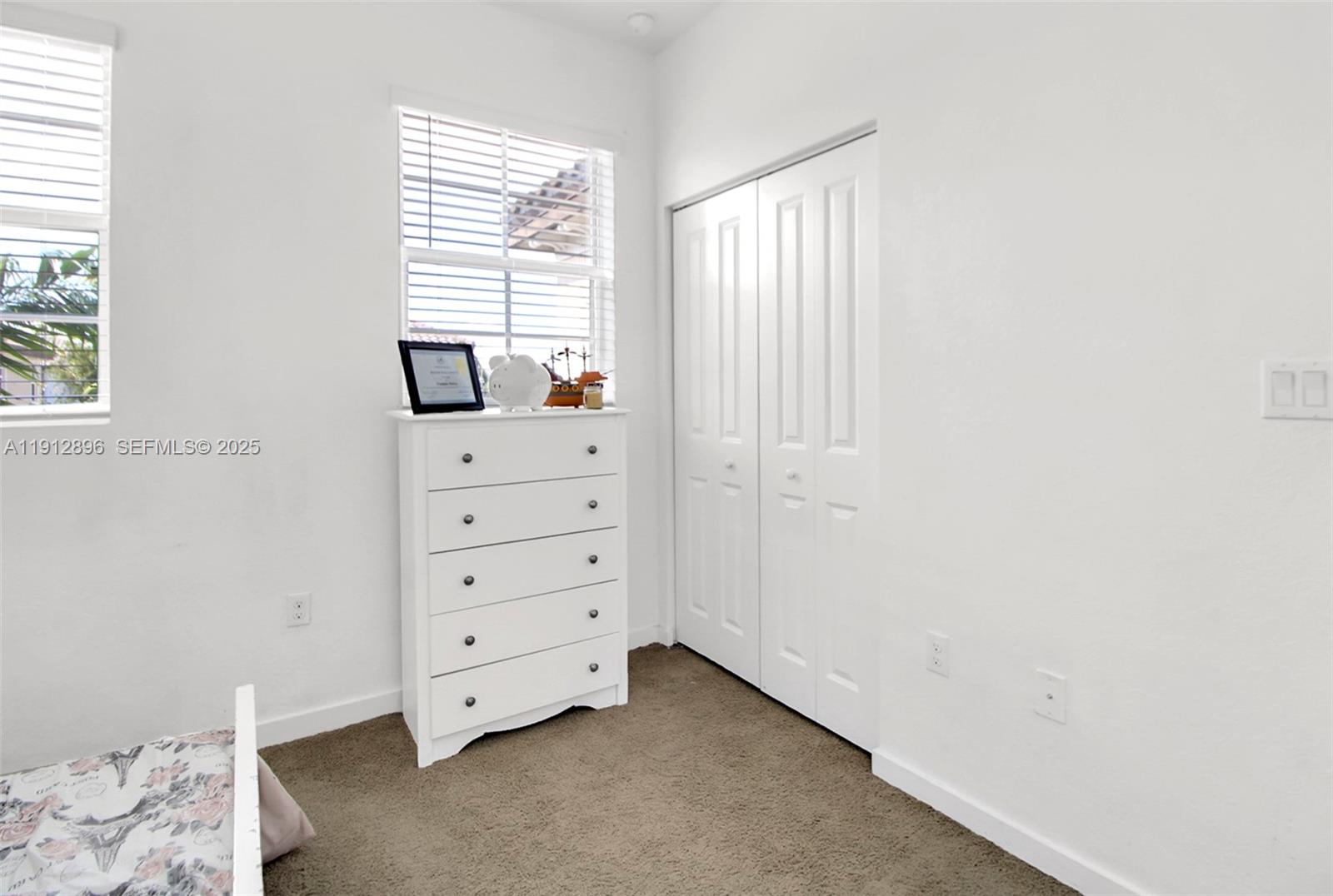 24301 Southwest 117 Path Homestead, FL 33032 - Photo 30 of 50 a view of room with window and cabinet