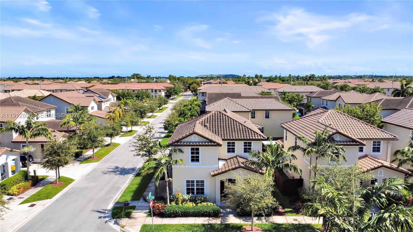 24301 Southwest 117 Path Homestead, FL 33032 - Photo 6 of 50 an aerial view of multiple house