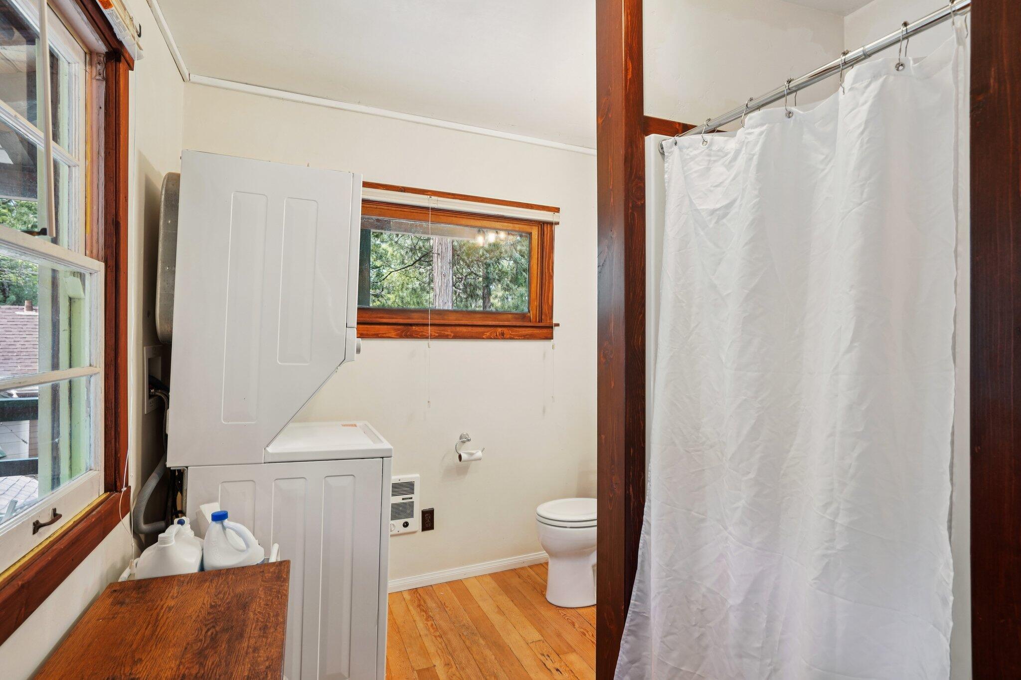 55280 Circle Way Idyllwild, CA 92549 - Photo 26 of 27 a bathroom with a toilet a sink and a mirror