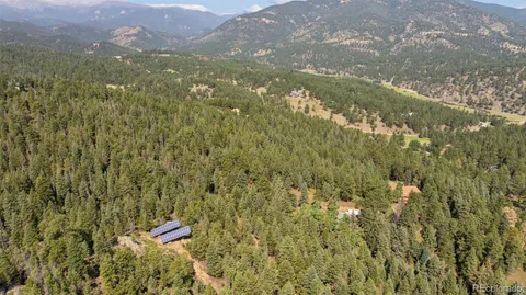 a view of outdoor space and a yard