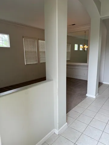 a view of an empty room and window