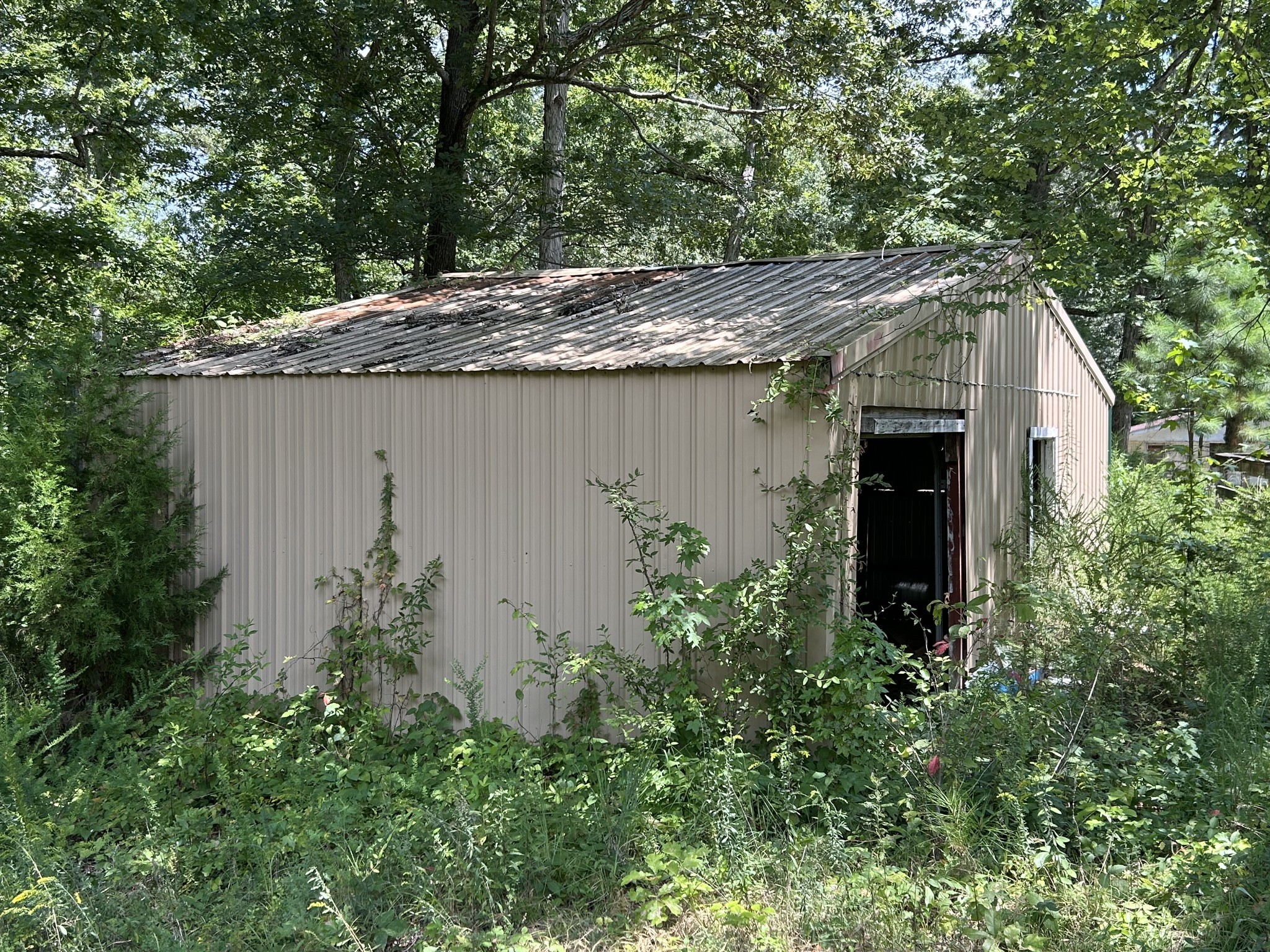885 Sandys Camp Road Big Sandy, TN 38221 - Photo 20 of 22 an outdoor view with patio