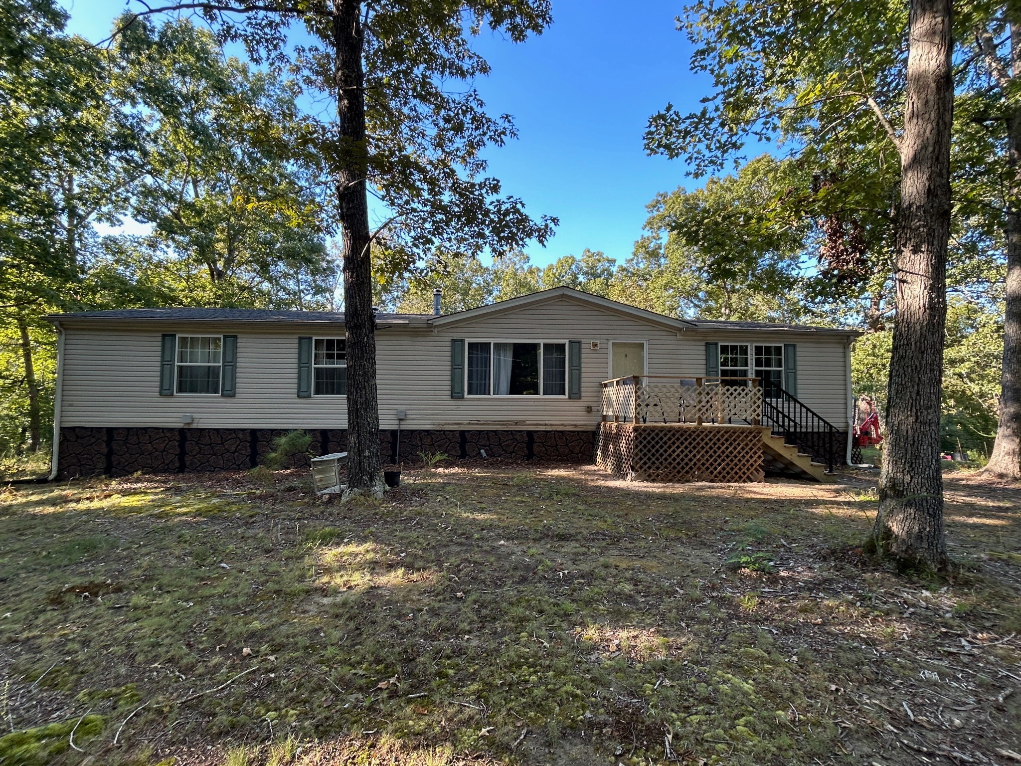 885 Sandys Camp Road Big Sandy, TN 38221 - Photo 3 of 22 a view of a house with a yard