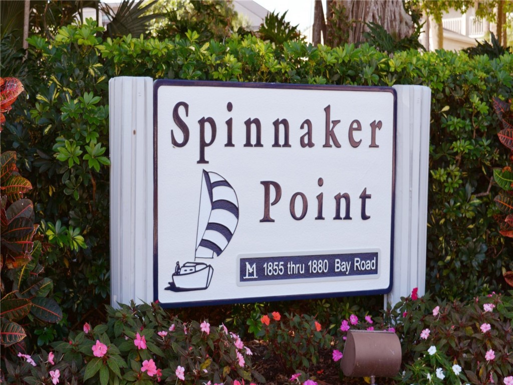 1880 Bay Road, Unit I319 Vero Beach, FL 32963 - Photo 24 of 36 a sign broad in front of flowers