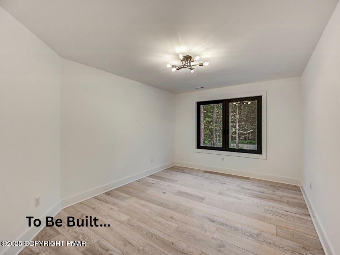 8-7 Sweet Briar Road Pocono Pines, PA 18350 - Photo 18 of 38 a view of an empty room with a window