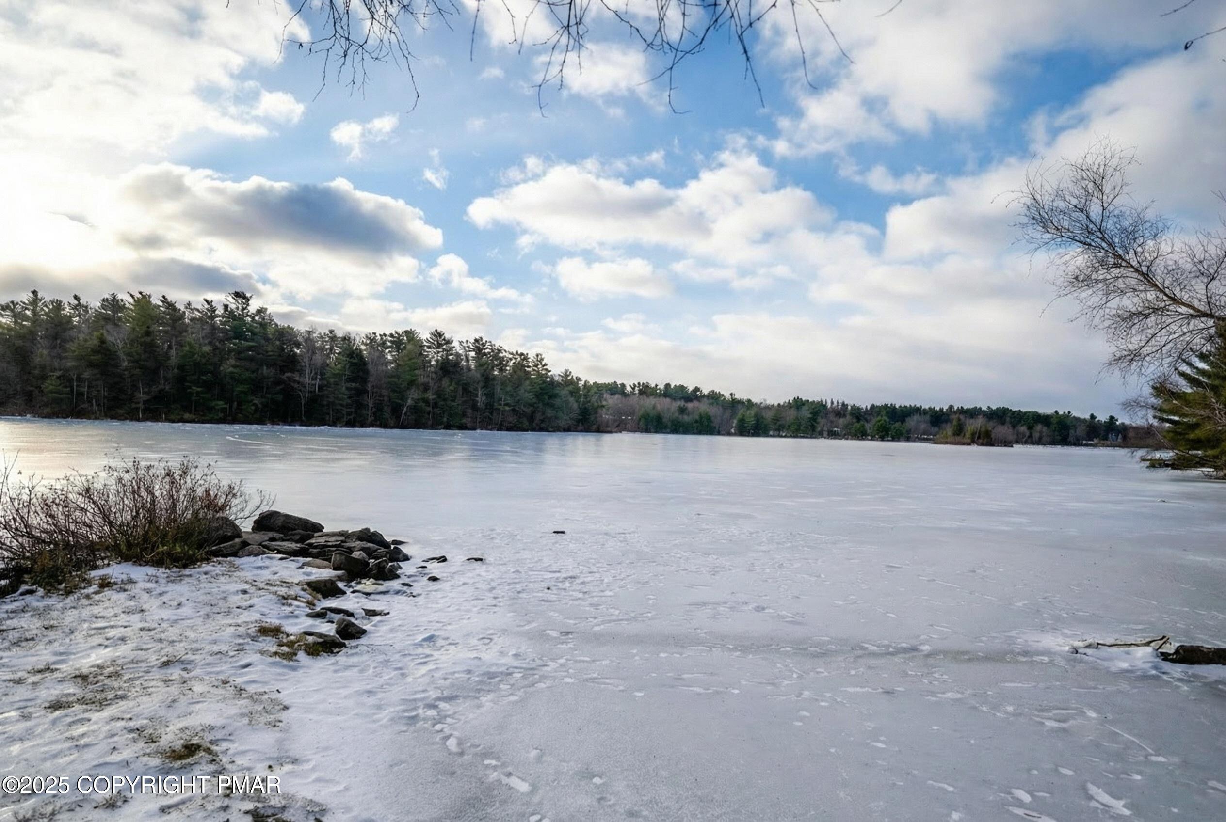 8-7 Sweet Briar Road Pocono Pines, PA 18350 - Photo 27 of 38 a view of a lake