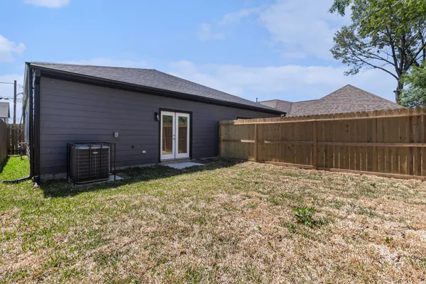 a house with yard in front of it