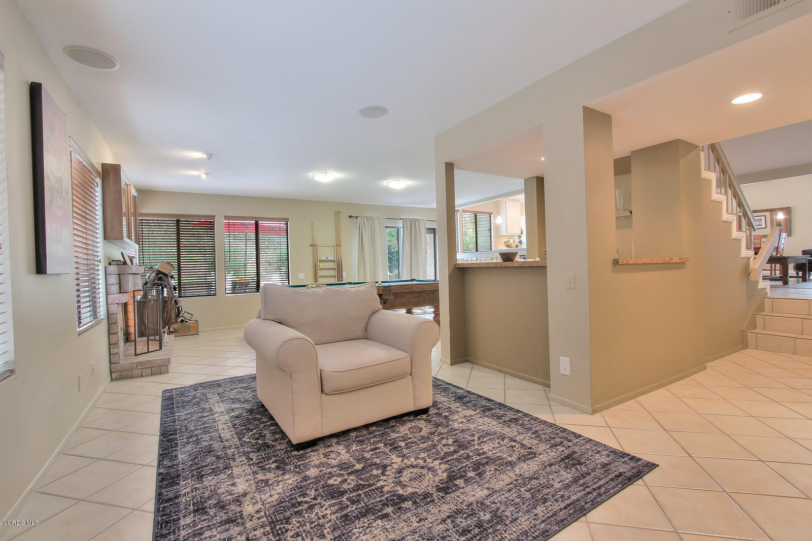 12510 Crystal Ranch Road Moorpark, CA 93021 - Photo 20 of 43 a living room with furniture and a rug