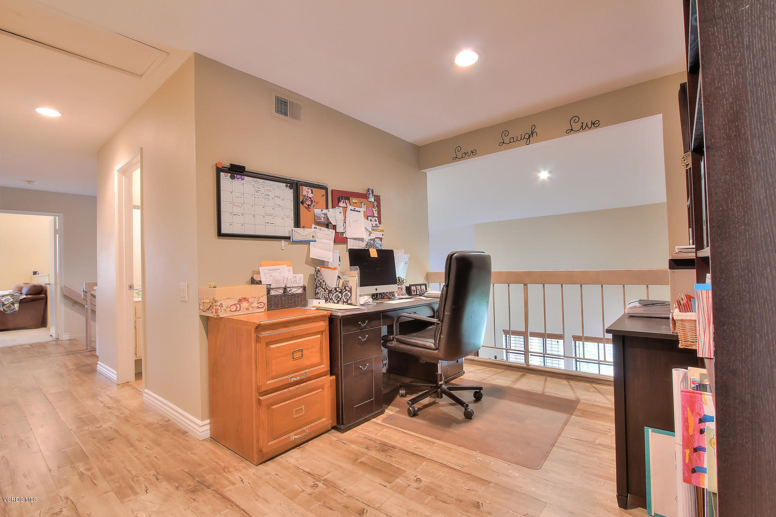 12510 Crystal Ranch Road Moorpark, CA 93021 - Photo 25 of 43 a view of a workspace with furniture and a window