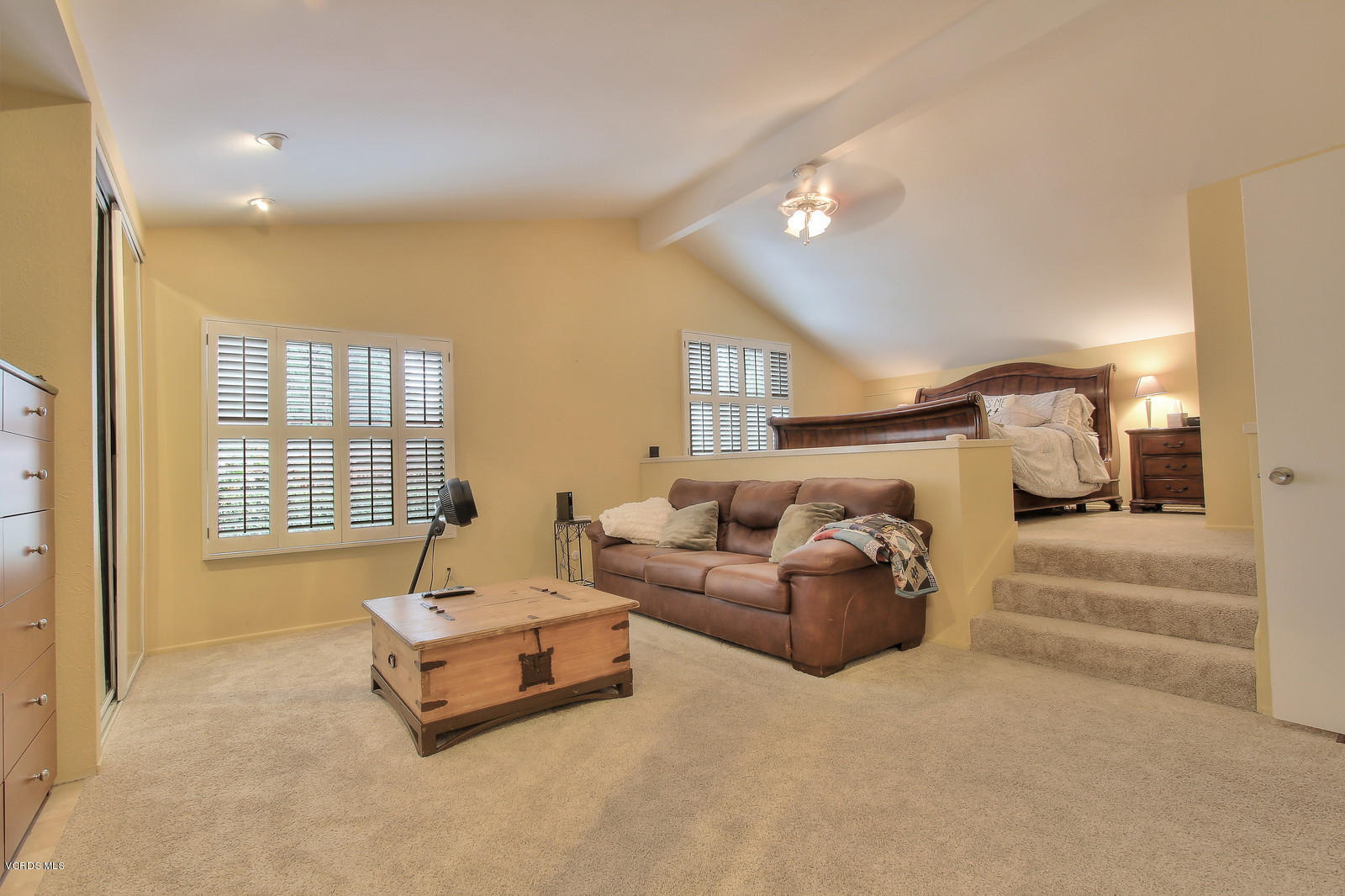 12510 Crystal Ranch Road Moorpark, CA 93021 - Photo 26 of 43 a spacious bedroom with a bed and couch