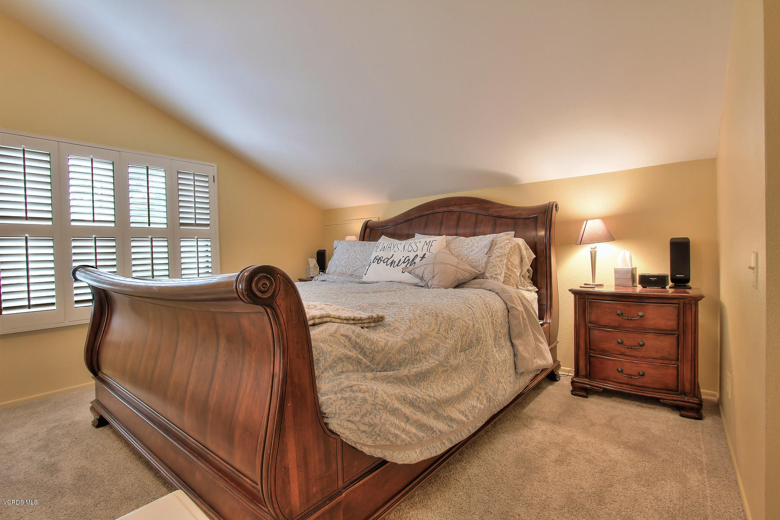 12510 Crystal Ranch Road Moorpark, CA 93021 - Photo 28 of 43 a bedroom with a bed and window