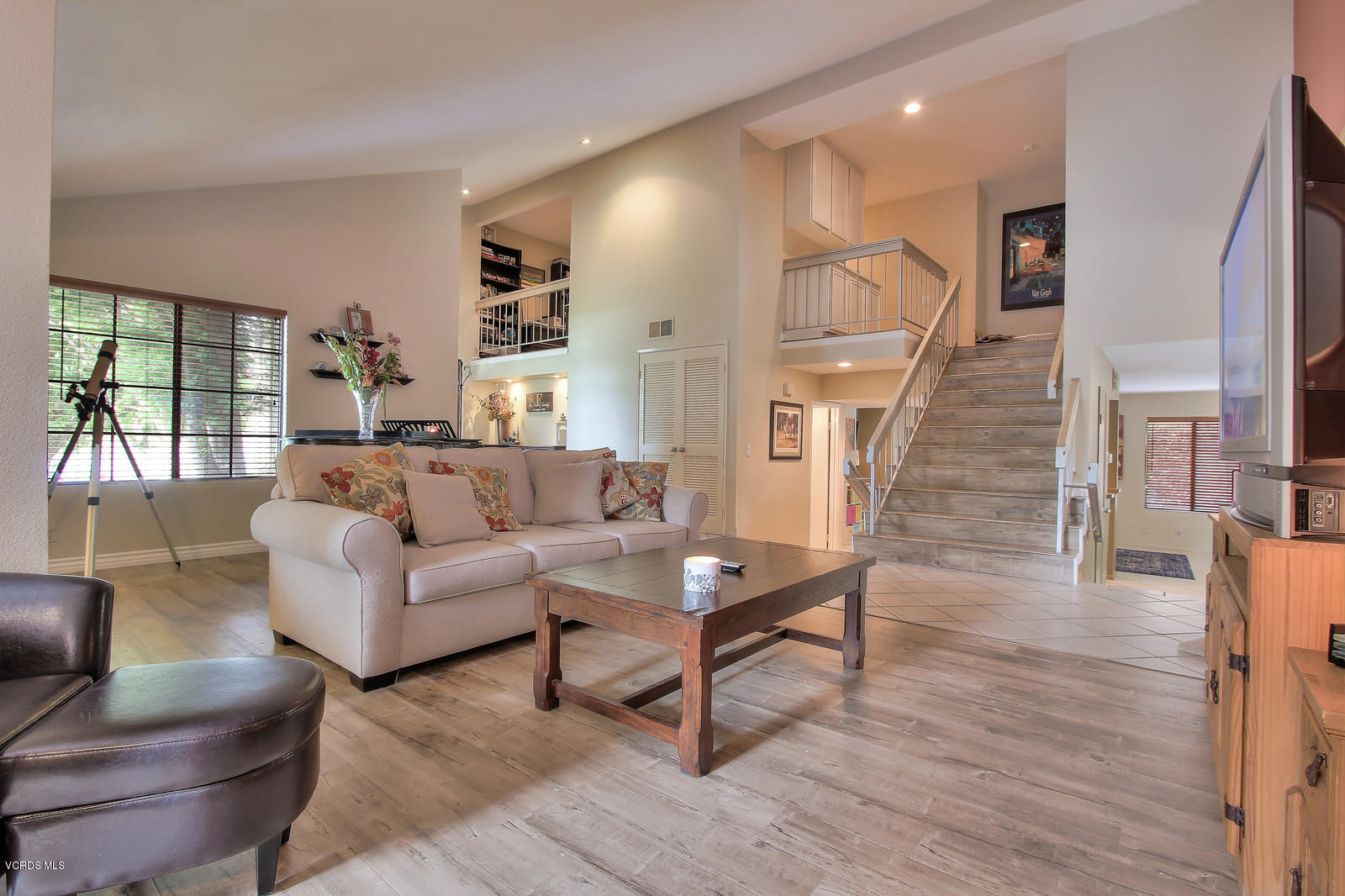 12510 Crystal Ranch Road Moorpark, CA 93021 - Photo 4 of 43 a living room with furniture and a wooden floor