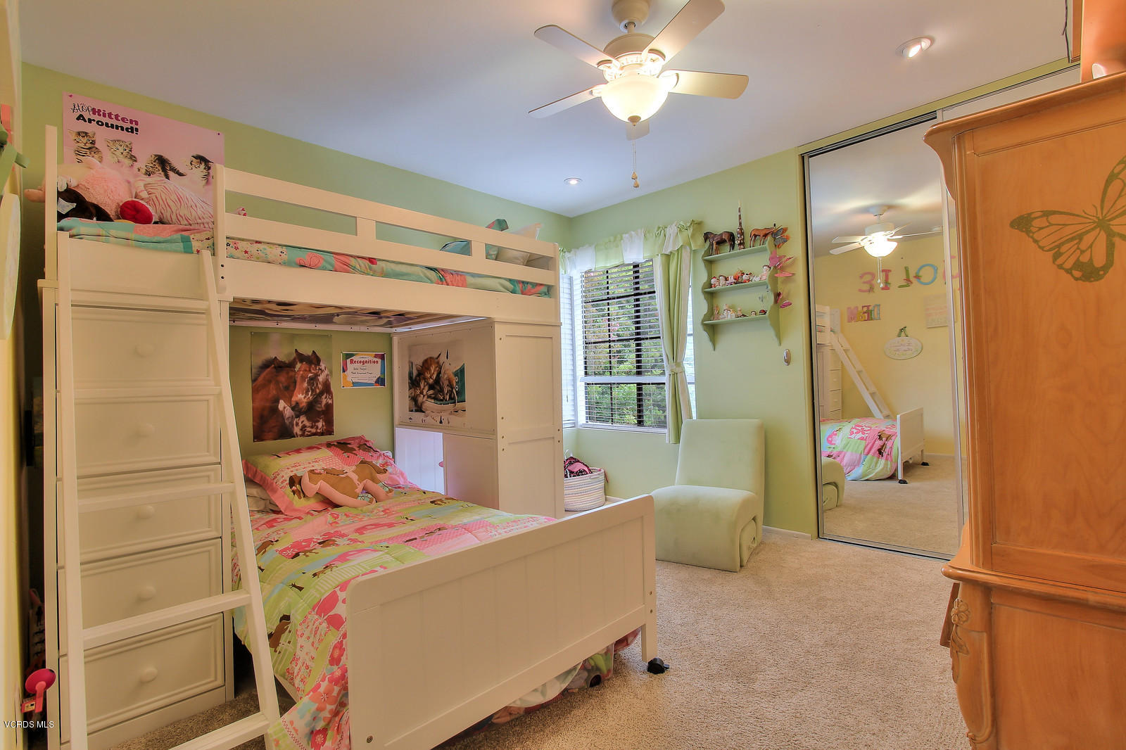 12510 Crystal Ranch Road Moorpark, CA 93021 - Photo 33 of 43 a bedroom with a bed and a chandelier