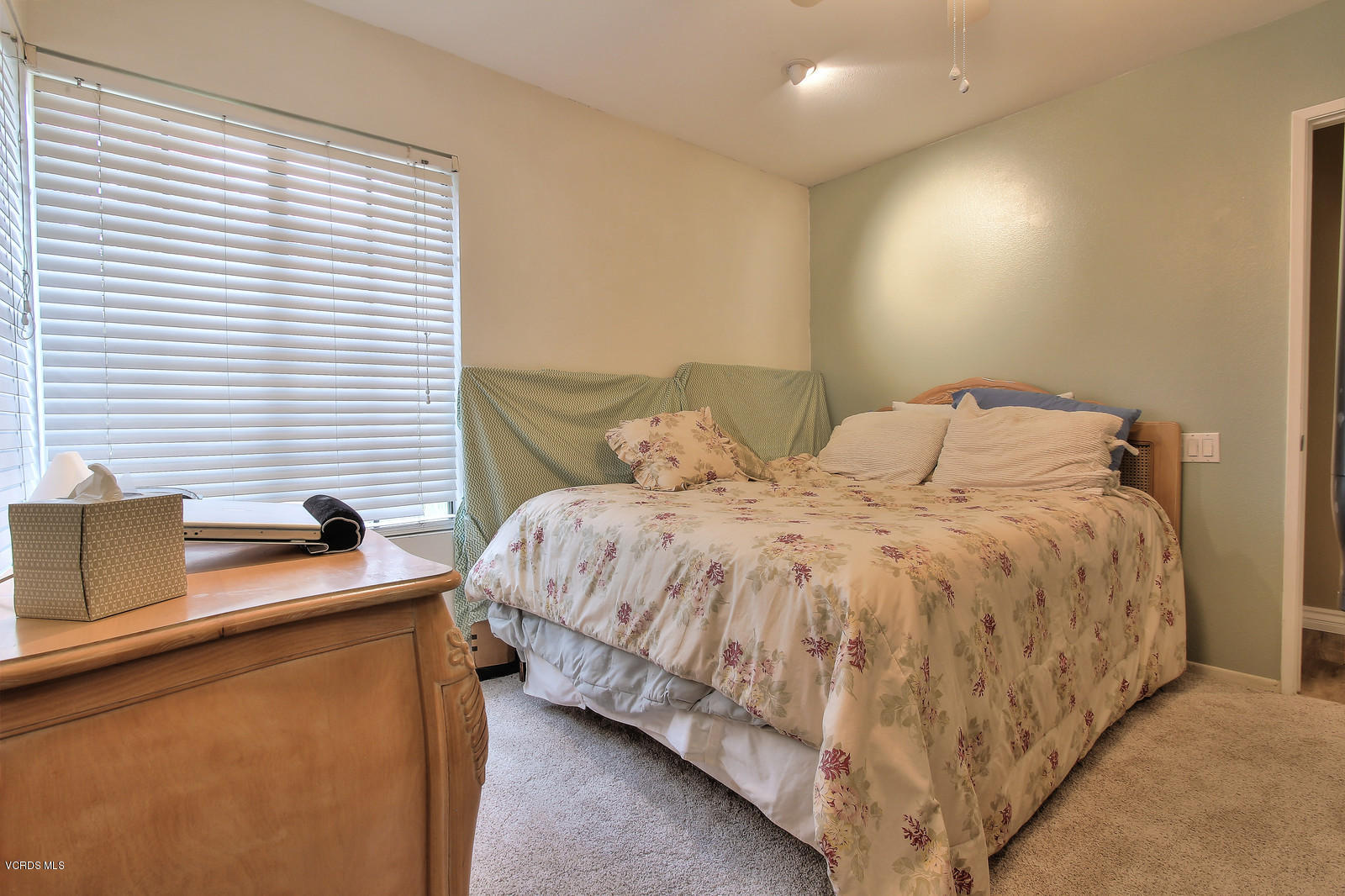 12510 Crystal Ranch Road Moorpark, CA 93021 - Photo 36 of 43 a bedroom with a bed and a large window