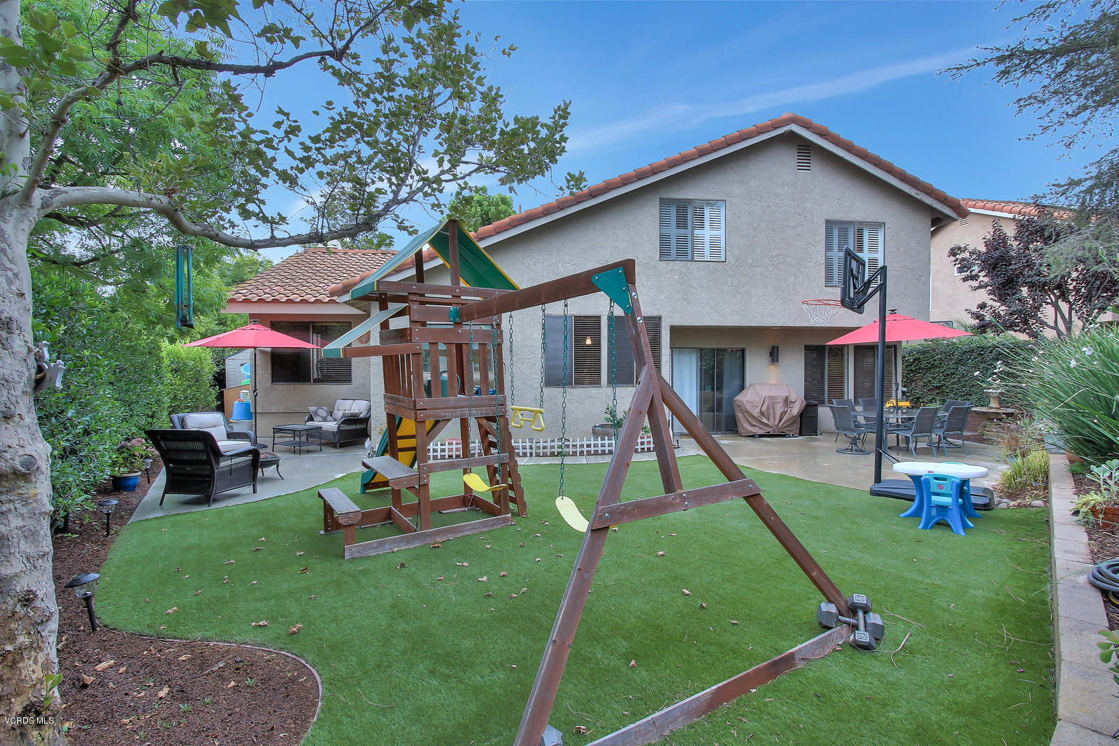 12510 Crystal Ranch Road Moorpark, CA 93021 - Photo 40 of 43 a view of a house with a yard