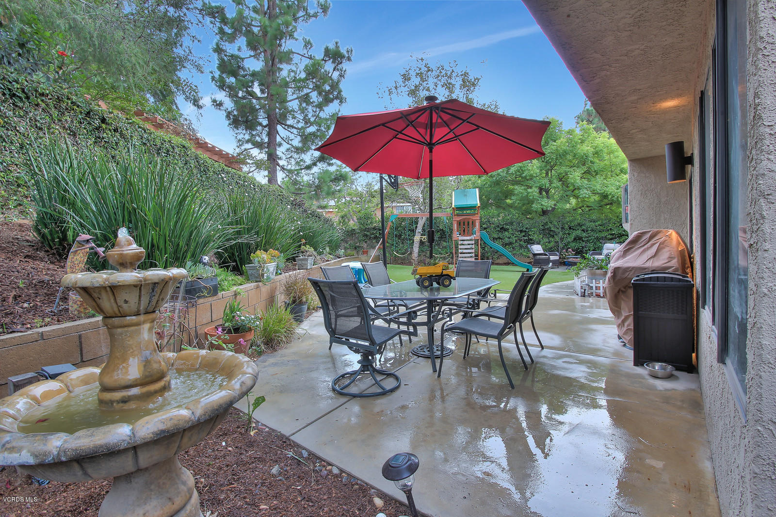 12510 Crystal Ranch Road Moorpark, CA 93021 - Photo 42 of 43 a view of a tables and chairs under an umbrella