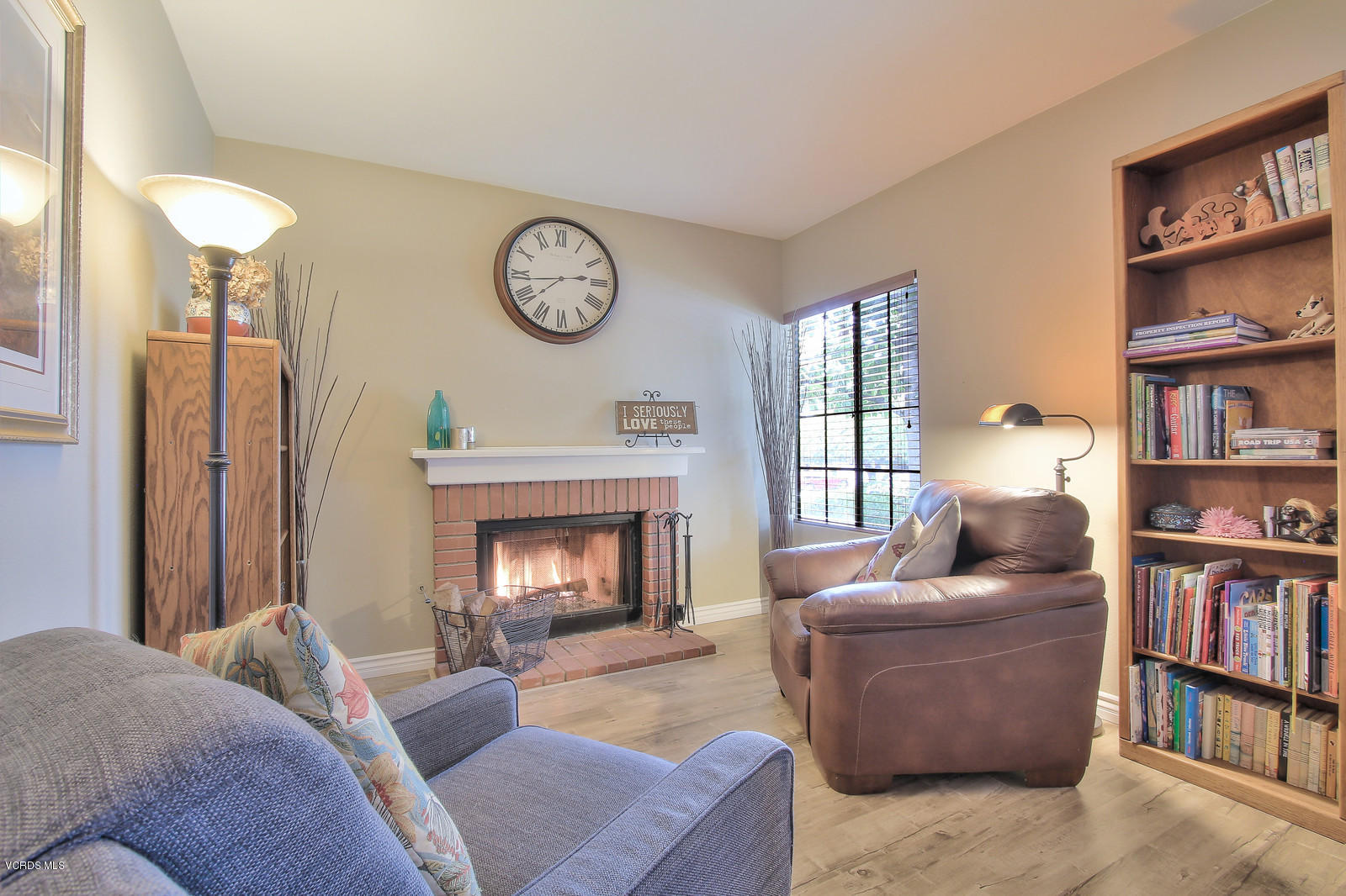 12510 Crystal Ranch Road Moorpark, CA 93021 - Photo 9 of 43 a living room with furniture and a fireplace