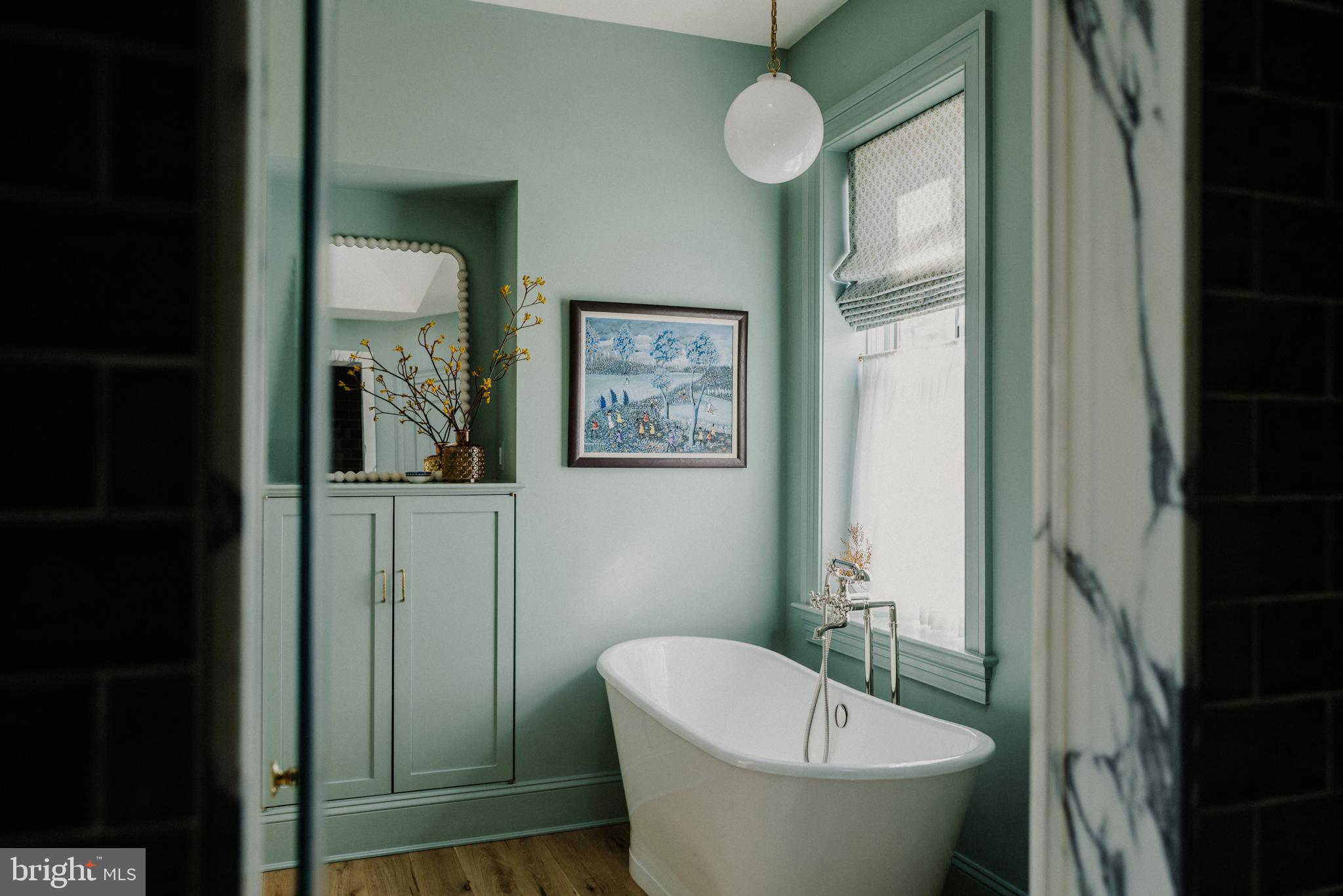 1000 Independence Avenue Southeast Washington, DC 20003 - Photo 4 of 4 a bath room with a toilet a sink and a mirror