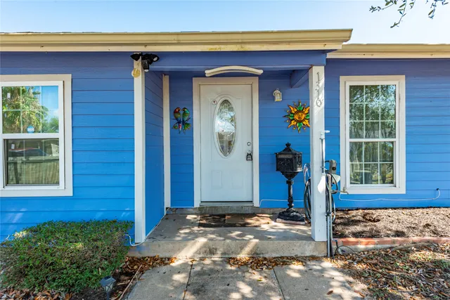 a front view of a house with a porch