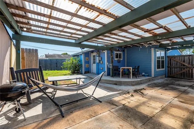 a view of a lounge chairs in the patio
