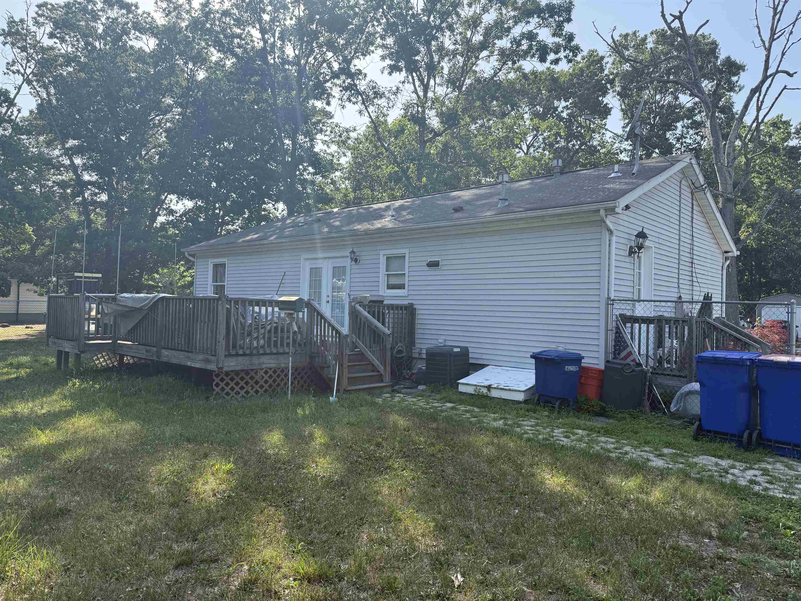 17 Willow Road Millville, NJ 08332 - Photo 3 of 13 a backyard of a house with seating space