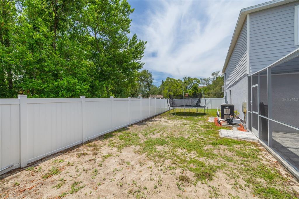 7242 Landmark Drive Spring Hill, FL 34606 - Photo 25 of 45 a view of a backyard