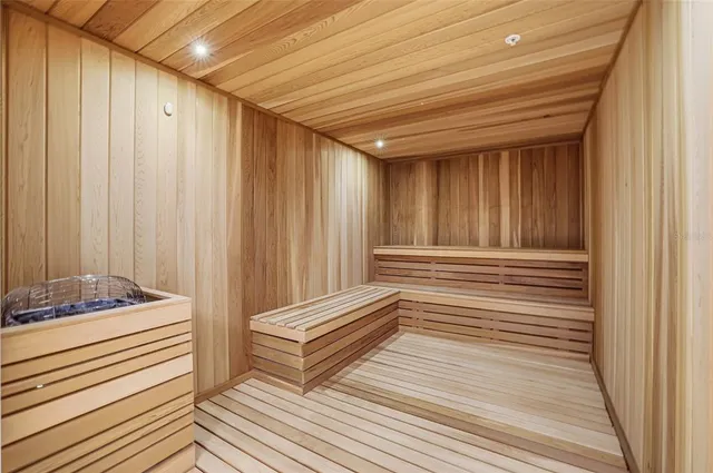 a view of a dining area with furniture and a potted plant