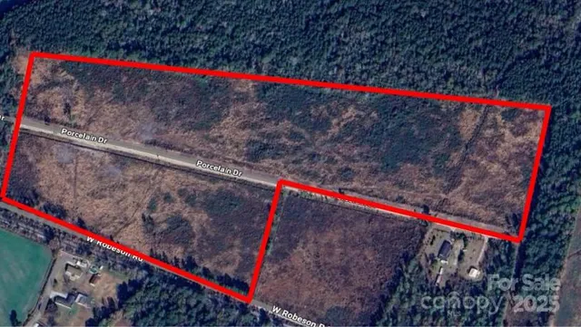 a street sign that is on a wooden wall