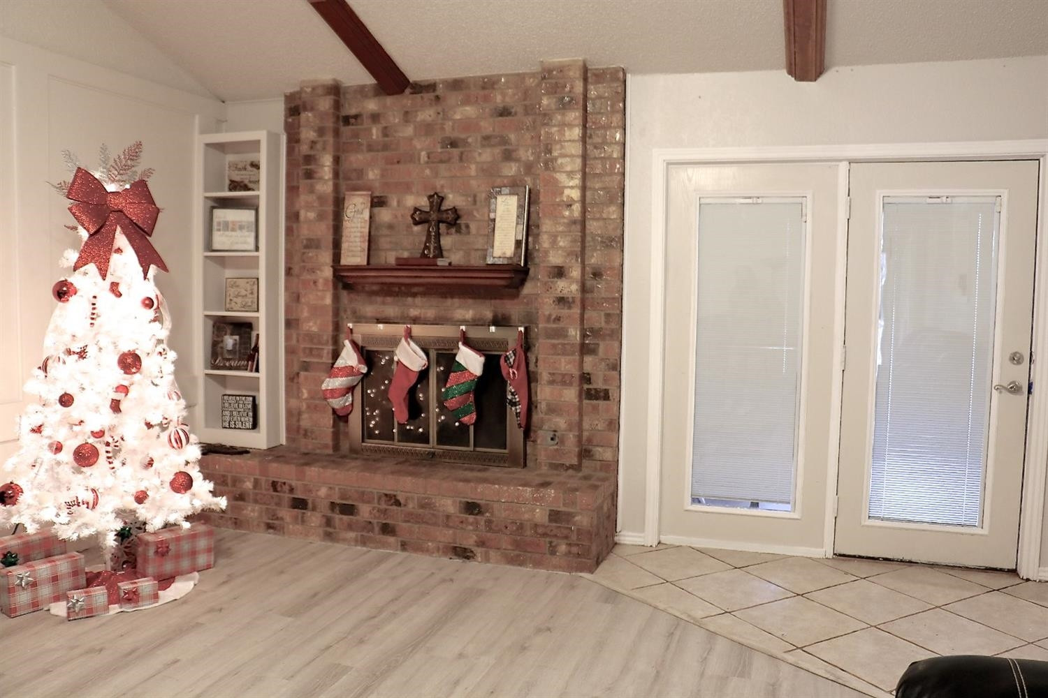 7004 Elkhart Avenue Lubbock, TX 79424 - Photo 21 of 44 a view of a livingroom with wooden floor and closet